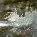 Water splashes and forms beautiful patterns.