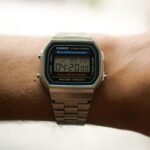 a close up of a person's wrist with a watch on it