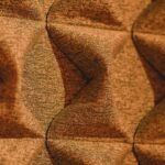 a close up of a wall with a pattern on it